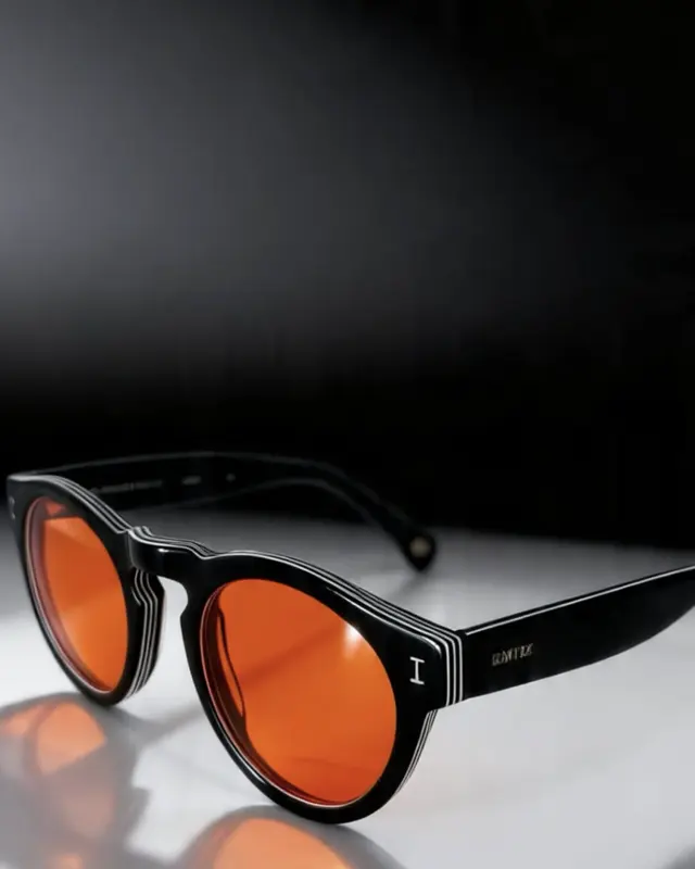 Gafas de sol redondas con lentes naranjas